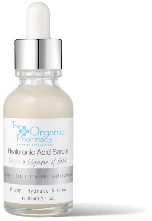 En liten glasflaska med droppare märkt 'Hyaluronic Acid Serum' från The Organic Pharmacy. Den är vit och silver med dropparlock.