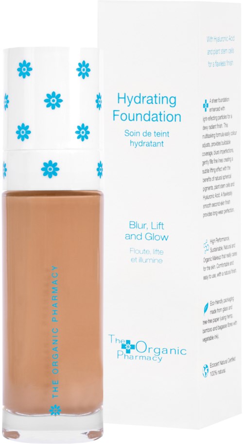 En flaska med återfuktande foundation med en vit låda med blå blomstermönster och produktdetaljer.