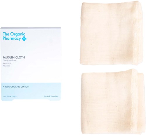 To naturlige bomuldsmuslinklude og en æske mærket 'The Organic Pharmacy' til vask og hudpleje.