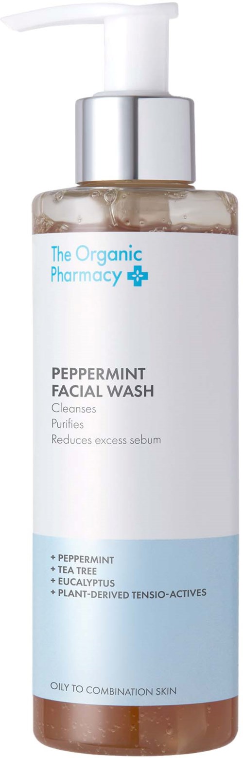 Eine transparente Flasche mit Pumpe zeigt Peppermint Facial Wash von The Organic Pharmacy. Es soll reinigen, reinigen und überschüssiges Sebum reduzieren.