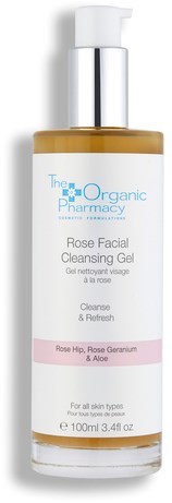 En hudvårdsflaska med etiketten 'Rose Facial Cleansing Gel' med vit och rosa text, innehåller ett rengöringsmedel för ansiktet.