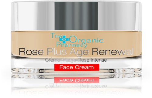 En burk märkt 'Rose Plus Age Renewal' dagkräm av The Organic Pharmacy, med ett silverlock och genomskinligt glasbehållare.