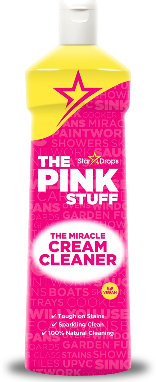 Lys rosa flaske med merke The Pink Stuff Cream Cleaner, en gul stjerne og vegansymbol.