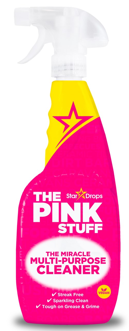 En lysende rosa sprayflaske merket The Pink Stuff Multi-Purpose Cleaner, med gul lokk og stjernedesign.