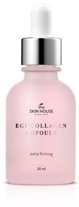 En rosa flaska med pipettkork märkt 'The Skin House' och 'Egg Collagen Ampoule' för hudvård.