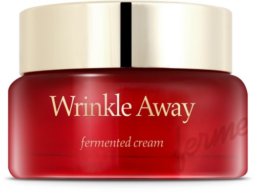 En röd burk med lock i beige färg märkt 'Wrinkle Away fermented cream.'