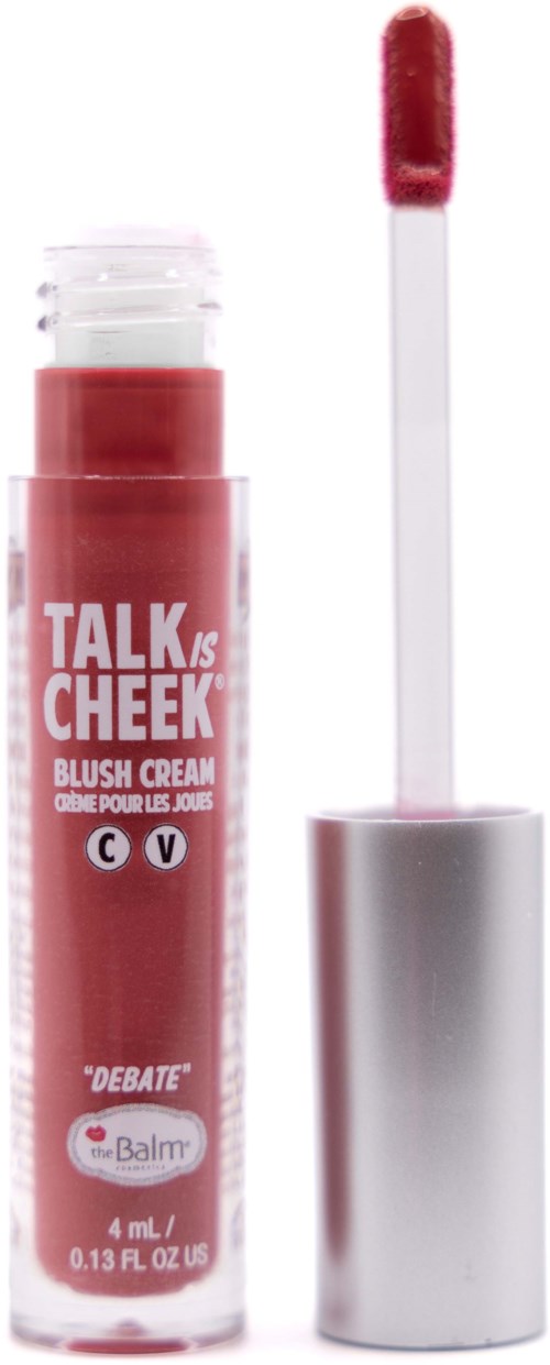 En rosa læbepomade eller blush-stift med hvid og sølv låg og en applikator.
