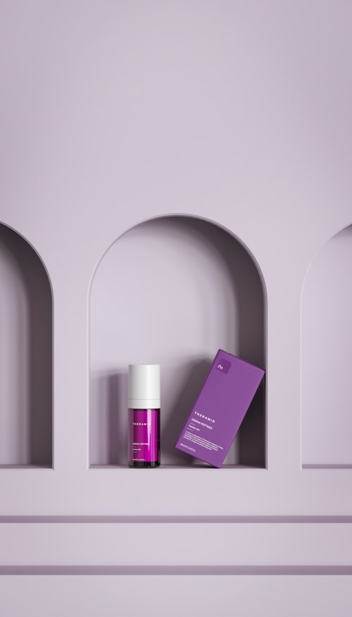 A purple cleansing product with a box, displayed in a minimalist, arched display shelf.