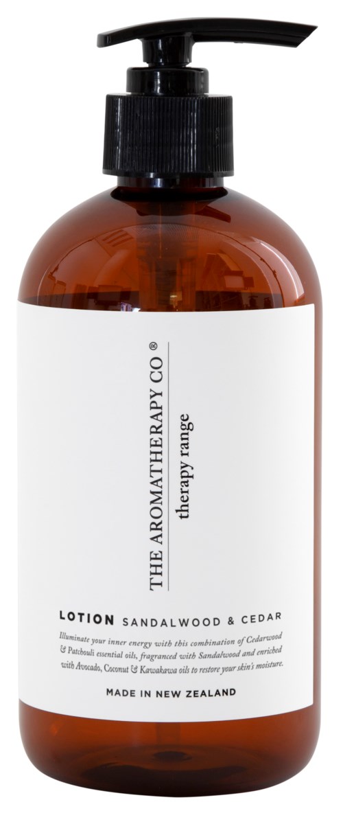 A brown bottle with a black pump labeled 'LOTION SANDALWOOD & CEDAR' from The Aromatherapy Co. in New Zealand.