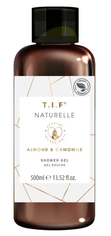 En brun flaska med svart lock, etiketten säger T.I.F. Naturelle Mandel & Kamomill duschgel, 500 ml.