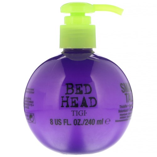 En rund lila flaska med grön pump märkt "Bed Head TIGI" och information om volym och produkt.