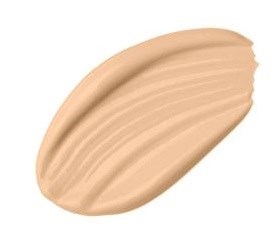 En beige vätska spridd i en kurvig form med synliga borststrok. Kanske makeup eller kräm.