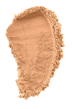 Ett beige pulverliknande ämne, formad ungefär som en fot eller ett blad, med linjer och textur som visar dess pulverform.