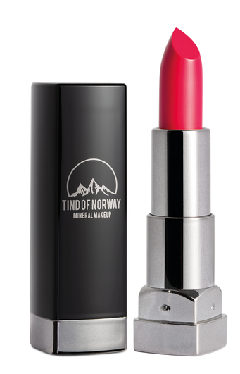 Et rosa leppestift med en sølvfarget tube og en svart eske med teksten 'Tind of Norway Mineral Makeup.'