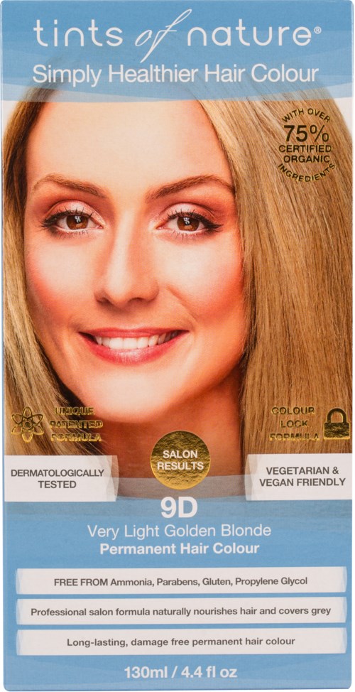 En blond kvinna med ett stort leende, reklam för hårfärg med hälsosamt, gyllene hår, certifierat ekologiskt och fritt från skadliga kemikalier.