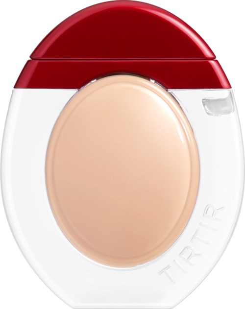 A compact container with a red lid and a beige button on the front.