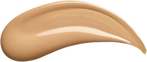 Een beige gekleurde crème of foundation uitgesmeerd op een witte achtergrond met een gladde, gebogen vorm.