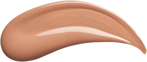 Een dikke laag beige foundation met een glanzende afwerking, gekruld in een golfvorm.