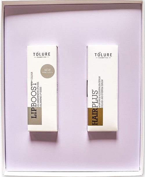 Two white boxes with text on them, placed inside a pink background display. One box is larger, the other smaller.