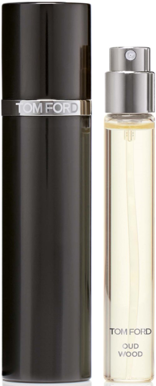 A black perfume bottle and a clear glass spray with silver details, labeled 'Tom Ford Oud Wood'.