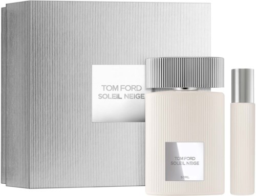Zestaw perfum Tom Ford Soleil Neige z pudełkiem, dużą butelką i mniejszą spray, w eleganckim srebrnym i białym kolorze.