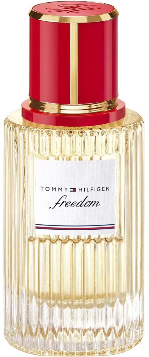 Tommy Hilfiger Freedom Parfümflasche mit genarbtem Glas und rot-goldenem Deckel.