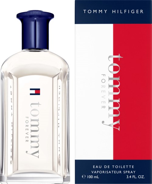 Butelka perfum Tommy Hilfiger z białym i czerwonym opakowaniem obok.