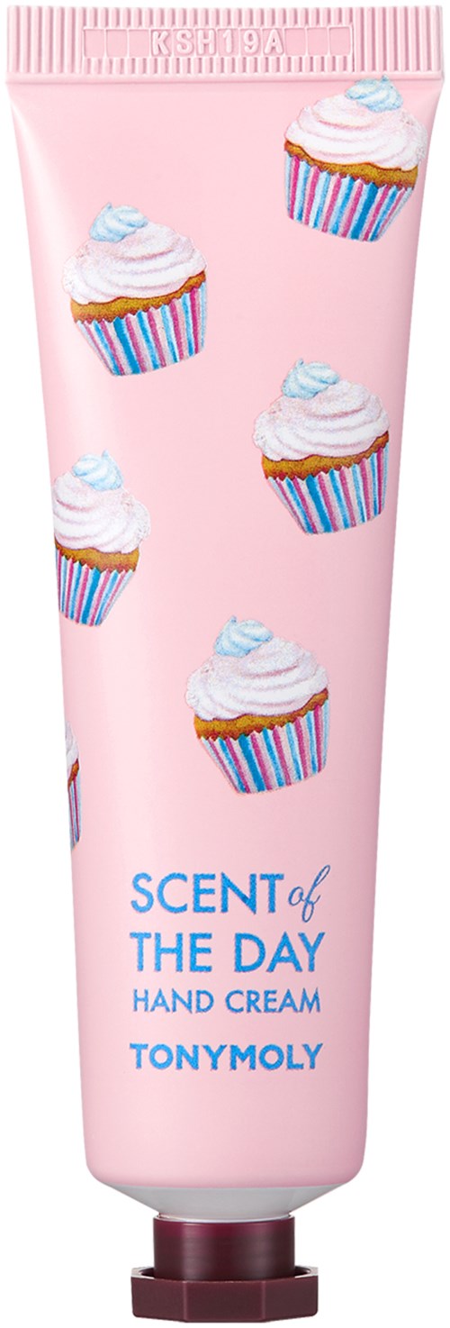 Lyserør håndkremtube med kakebilder og blå tekst som sier 'SCENT of THE DAY HAND CREAM TONYMOLY'.