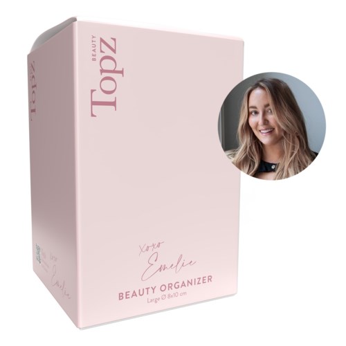En rosa låda märkt 'Beauty Top2' med en bild av en leende kvinna på sidan.