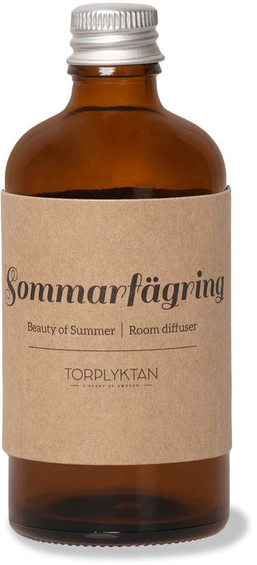 En bruns flaska märkt "Sommarfägring" med en silverkork, beskriven som en sommar rumsdiffusor.