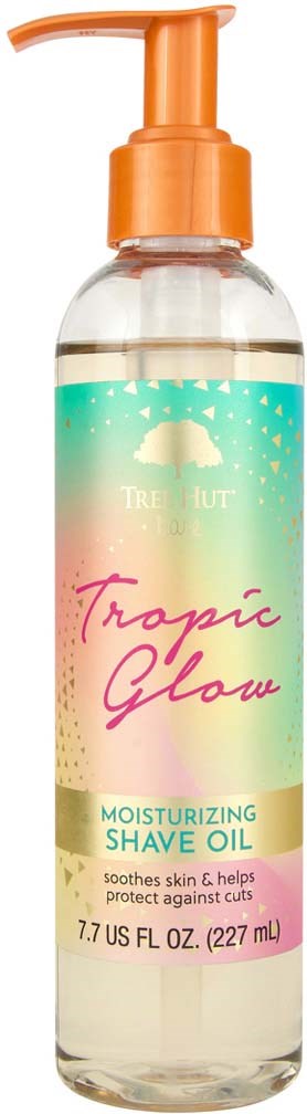 A clear bottle with an orange pump, labeled 'Tropic Glow' moisturizing shave oil, designed to soothe and protect skin.