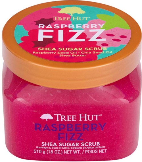 A pink jar with a colorful lid, labeled as Tree Hut Raspberry Fizz shea sugar scrub with ingredients listed.
