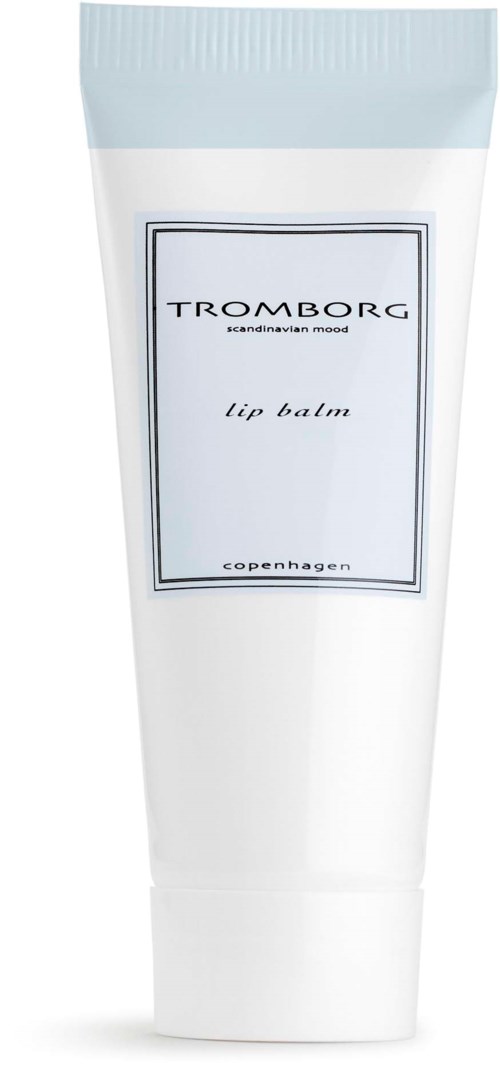 En hvit tube med blå lokk, merket 'Tromborg lip balm, København'.