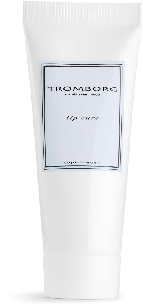 En hvid tube med læbepomade mærket Tromborg Lip Cure fra København.