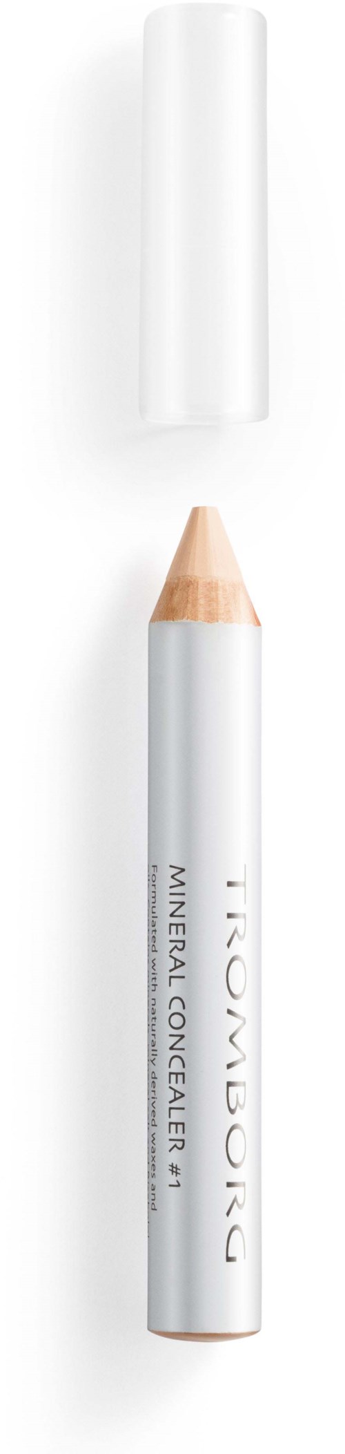 En hvid læbestiftspenn med låg, mærket 'Mineral Concealer' og 'Dior', vist lodret.