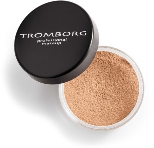 En rund beholder med beige pudder med sort låg mærket 'TROMBORG professional makeup'.