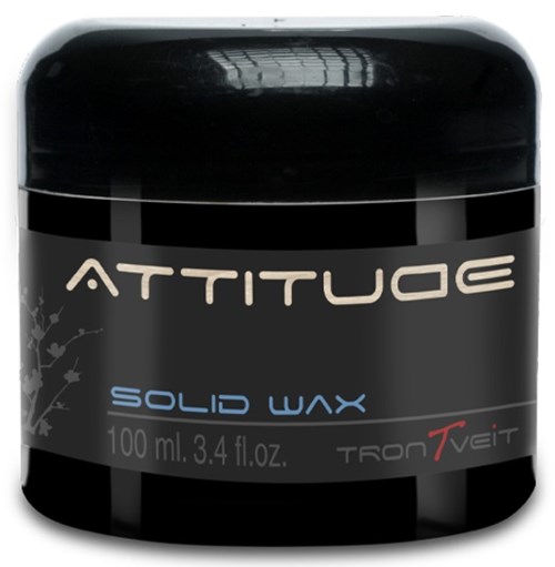 En svart burk med etiketten 'ATTITUDE SOLID WAX' innehållande 100 ml hårvaxprodukt.