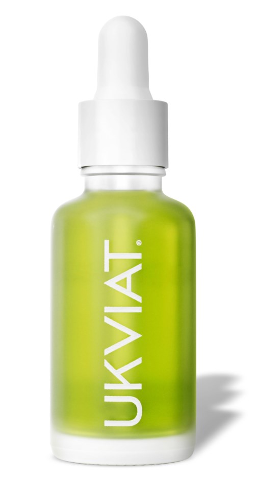 Een klein groene fles met pipette en de tekst 'UKVIT'.