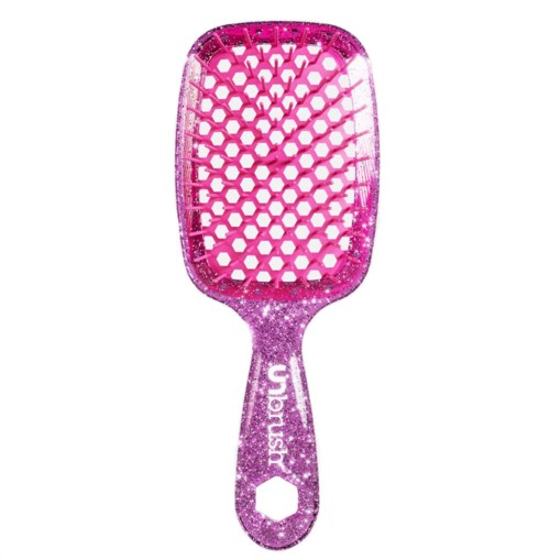 Vaalen glitter-harja, jossa on kuusikulmainen reikä kahvassa ja verkkomainen rakenne hiusten selvittämiseen.