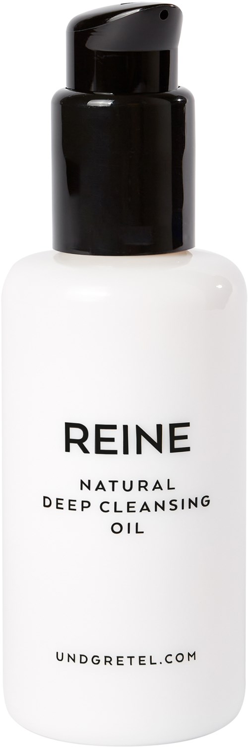En vit flaska med svart pump innehåller naturlig djup rengöringsolja från REINE.