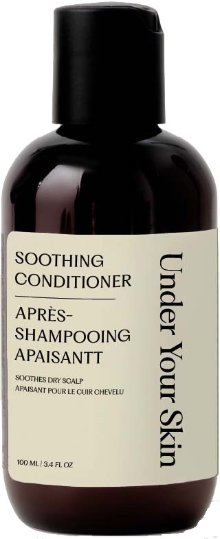 En mørkebrun flaske med scalp soothing balsam med sort låg og beige label.