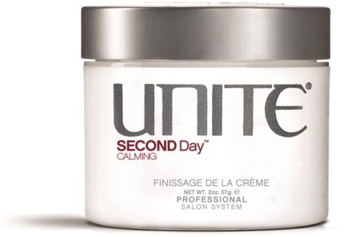 En vit burk med silverlock märkt "UNITE SECOND Day CALMING" hårkräm.
