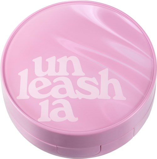 Pink round container with white text that says 'unleash la'.
