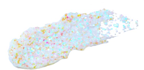 A cookie shaped like a whale, covered with colorful sprinkles, with a tail and fins.