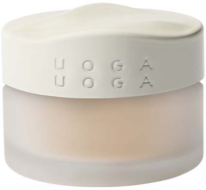 En hvid krukke mærket 'UOGA UOGA' med et glat låg, sandsynligvis en kosmetik- eller hudplejeproduktbeholder.