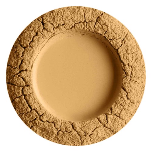 En sprækket, beige rund genstand med hul i midten, der ligner en cookie eller smallkage.