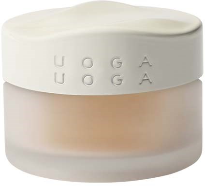 En hvid, rund beholder med en creme indeni, mærket med teksten "UOGA UOGA."