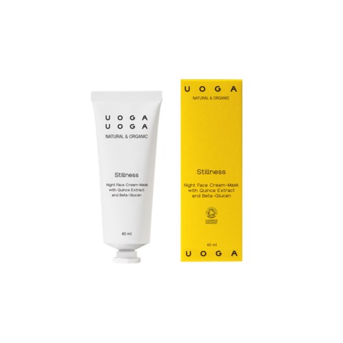 A white tube and yellow box of skincare product called Stillness, with black and yellow text on the packaging.