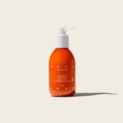 Orangene Flasche mit weißem Pumphahn, Kennzeichnung UOGA Good Mood Concentrate mit Orangenduft, 200 ml.