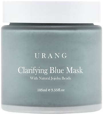 En krukke med URANG Clarifying Blue Mask med Jojoba-korn, 105 ml, i lys blå emballasje.